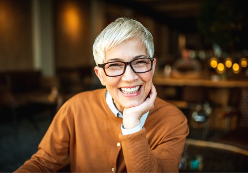 Happy woman smiling with Dentures in Peoria IL