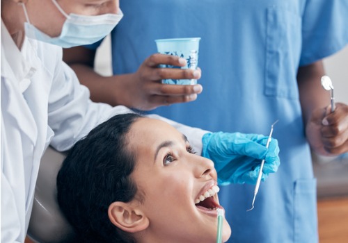A young woman receives dental care. River City Family Dentistry offers dental services.