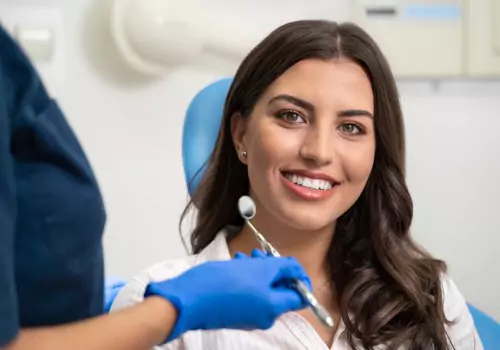 A woman is seen at a dental visit. River City Family Dentistry is a dental office in Peoria IL.